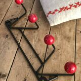 Red and black coat rack