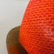 Pair of orange plexiglass and curved brass wall lights, 1950s, Germany