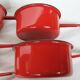 Red enamelled sheet metal pans