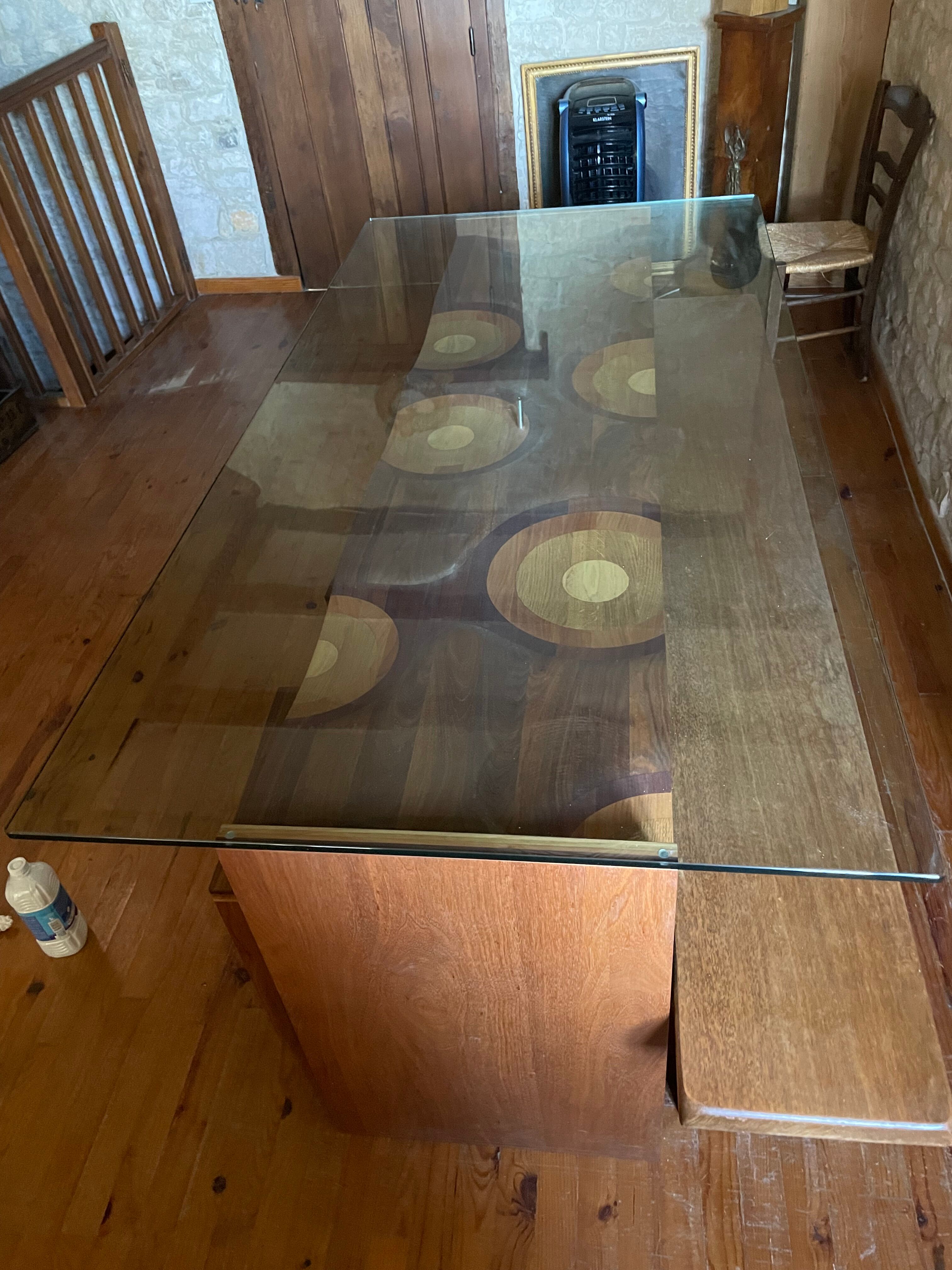 Dining table and 3 Ripples stools by Toyo Ito.