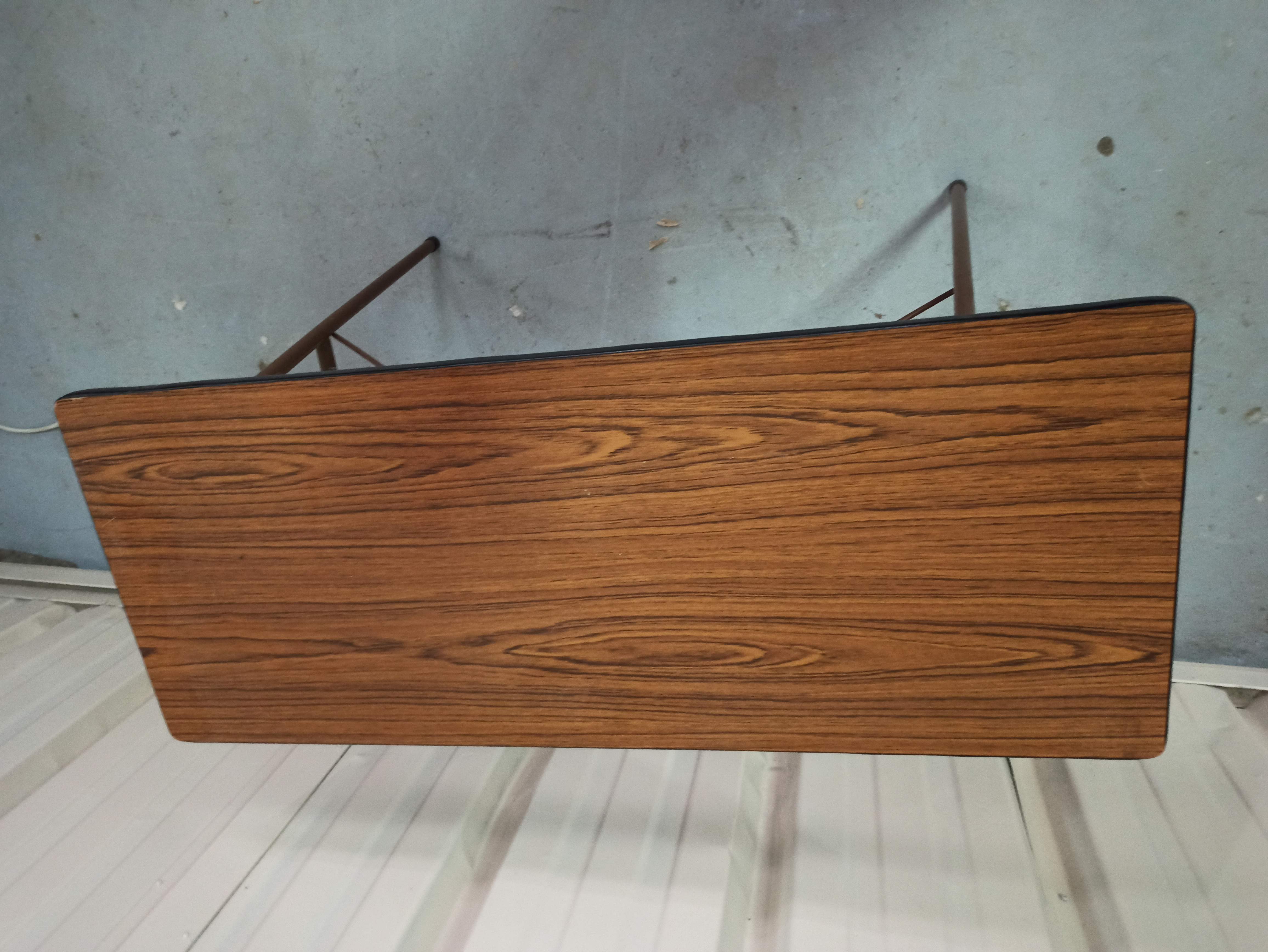 Folding table in formica brown console