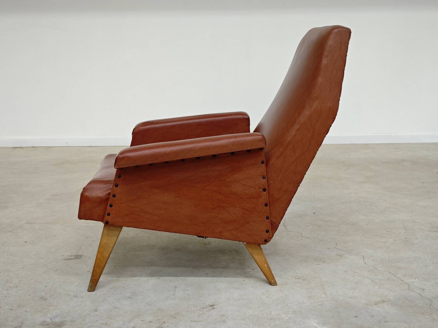 Camel brown imitation leather armchair, France 1960