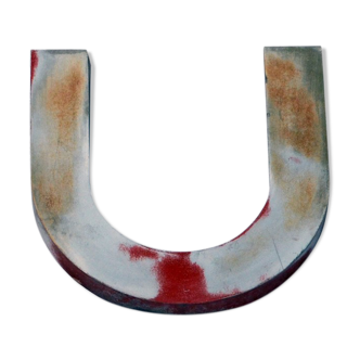 Sign letter in ancient zinc "U"