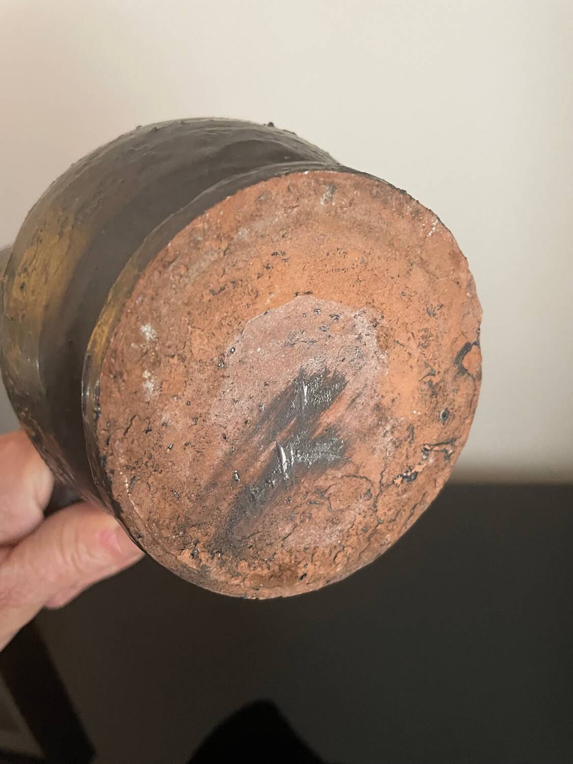Black ceramic pitcher by Jean Marais