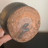 Black ceramic pitcher by Jean Marais