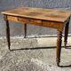 19th-century desk table in light walnut with one drawer.
