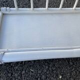 White rattan shelf with braces
