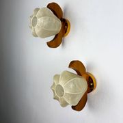 Pair of pear-shaped "Cocoon" wall sconces, resin and pine wood, Italy, circa 1970s
