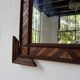 Pair of wooden mirrors in tramp art style