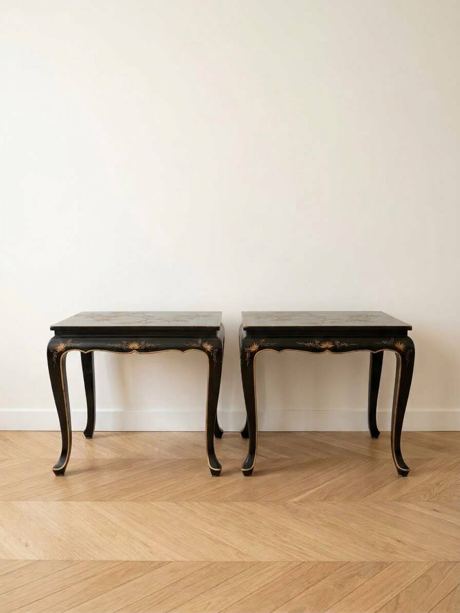 Set of 2 Chinese low tables in black lacquered wood with gold decoration.