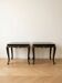 Lot de 2 tables basses chinoises en bois laqué noir et décor doré