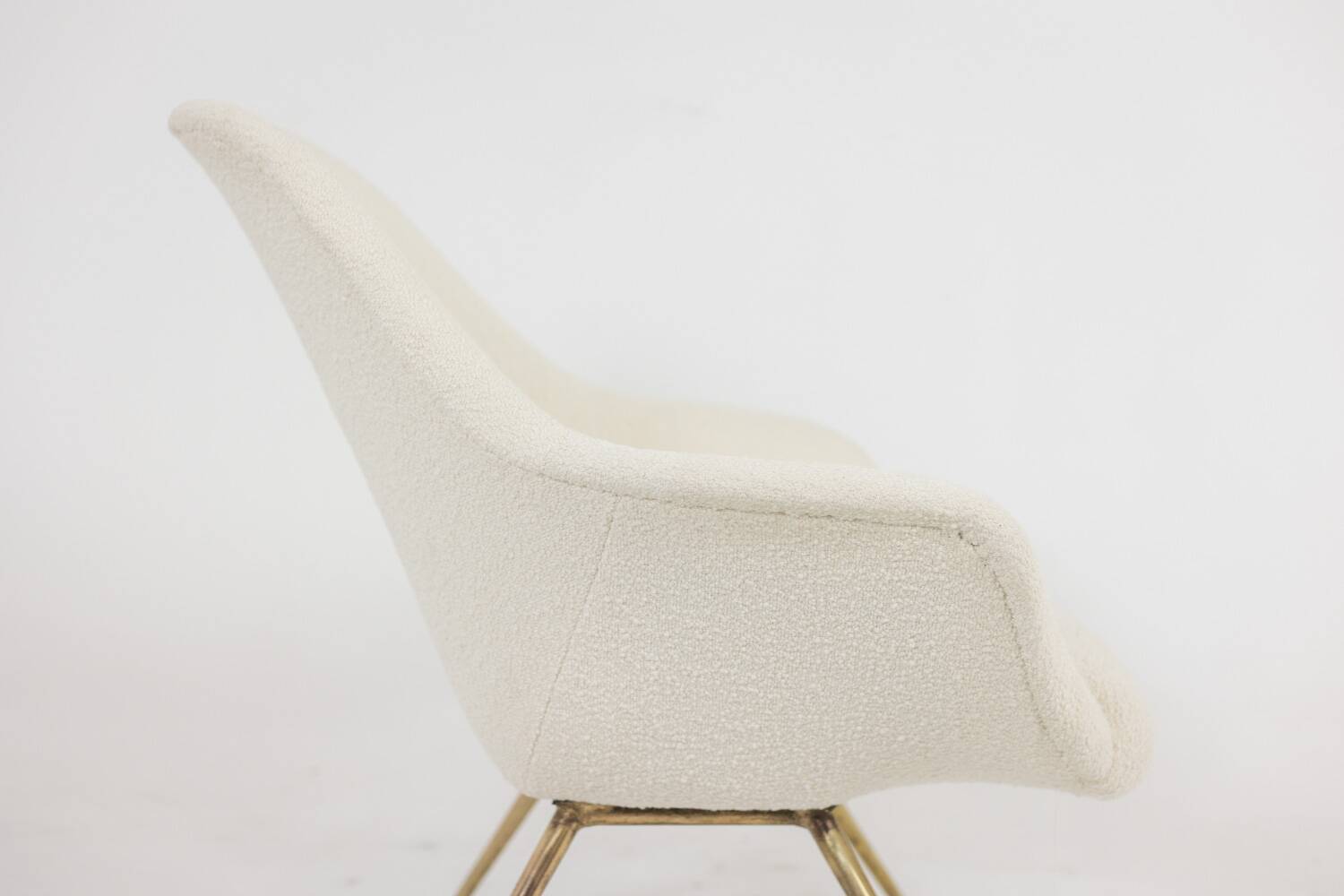 Pair of cocktail armchairs in gilded brass. 1960s.