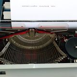 Erika portable typewriter with her briefette - notice and accessories