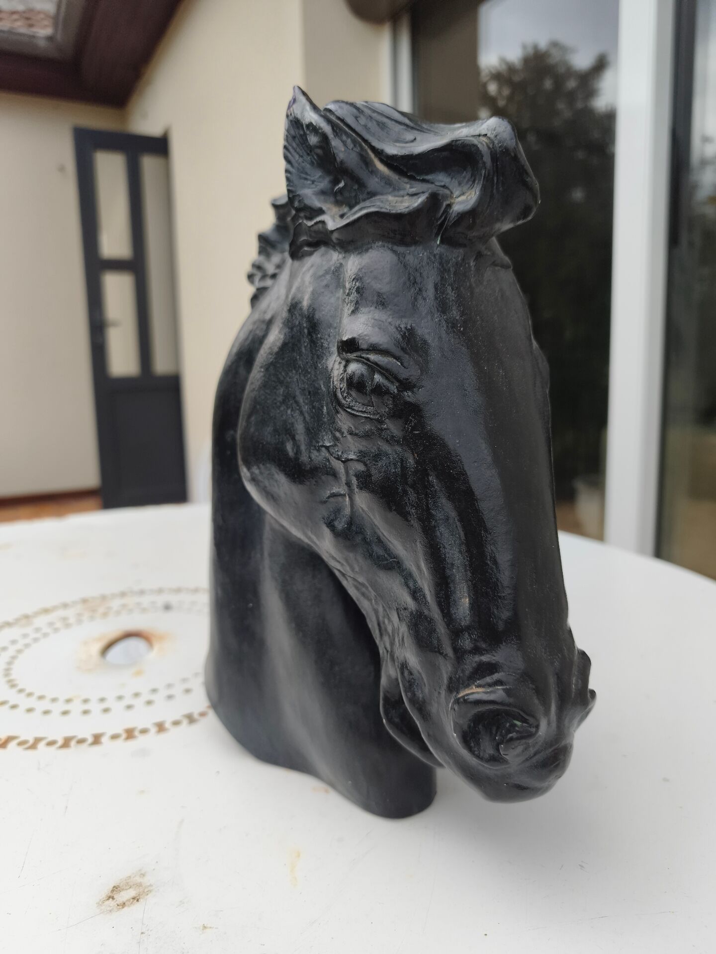 Plaster bust.