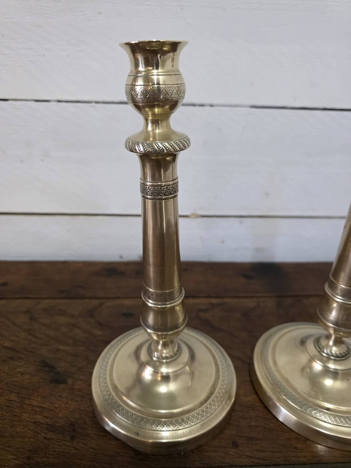 Antique pair of brass candlesticks