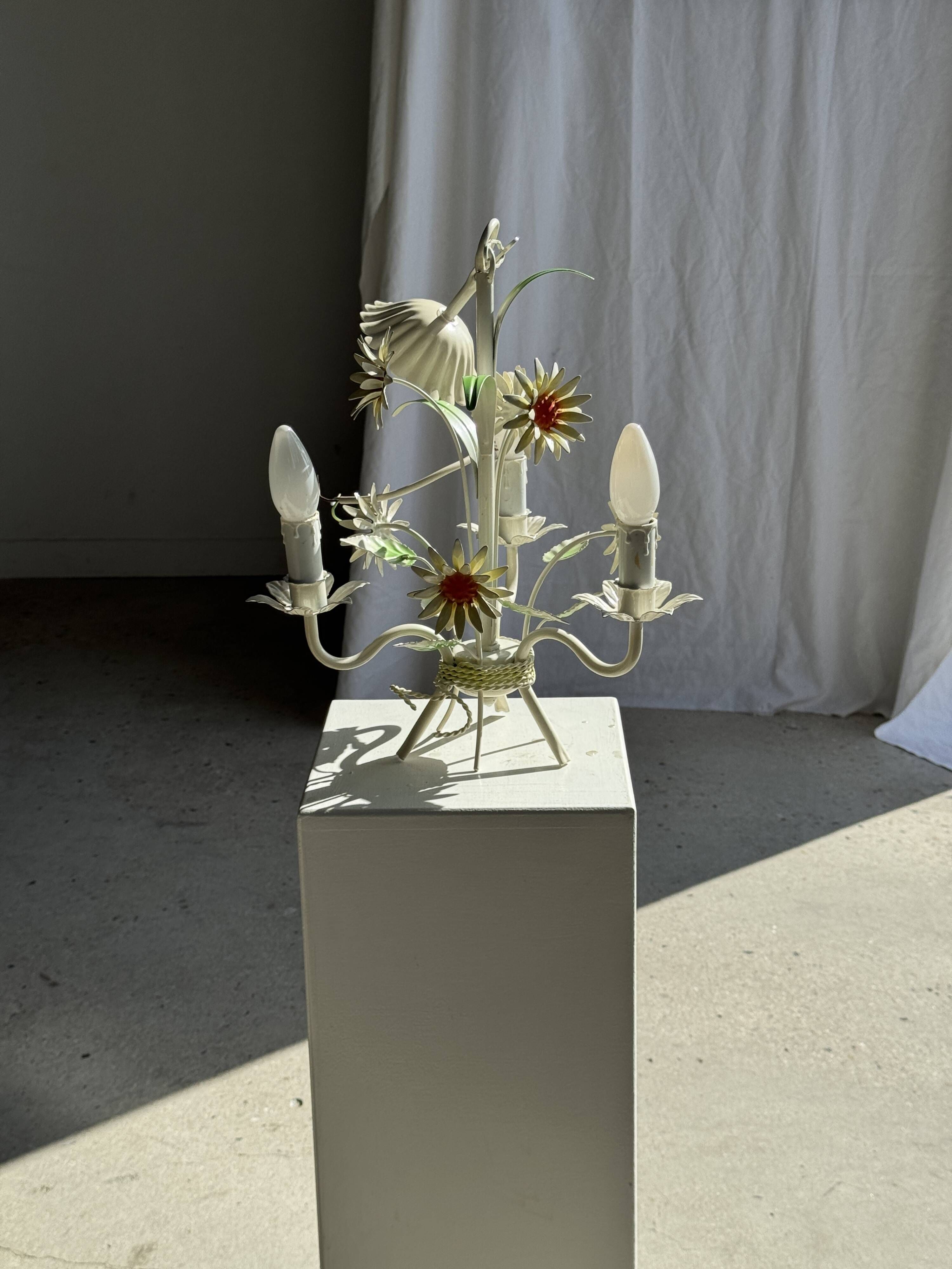 Small vintage cream metal flower chandelier with orange flowers and 3 arms.