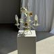 Small vintage cream metal flower chandelier with orange flowers and 3 arms.