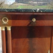 Flamed mahogany enfilade with sea green marble in Empire style.