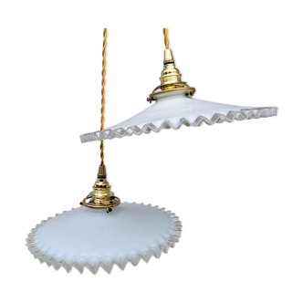 Duo of serrated opaline suspensions