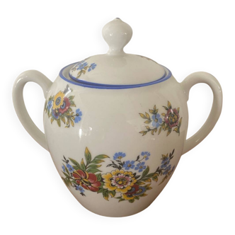 Large sugar bowl with floral porcelain.