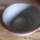 Enamelled terracotta pot