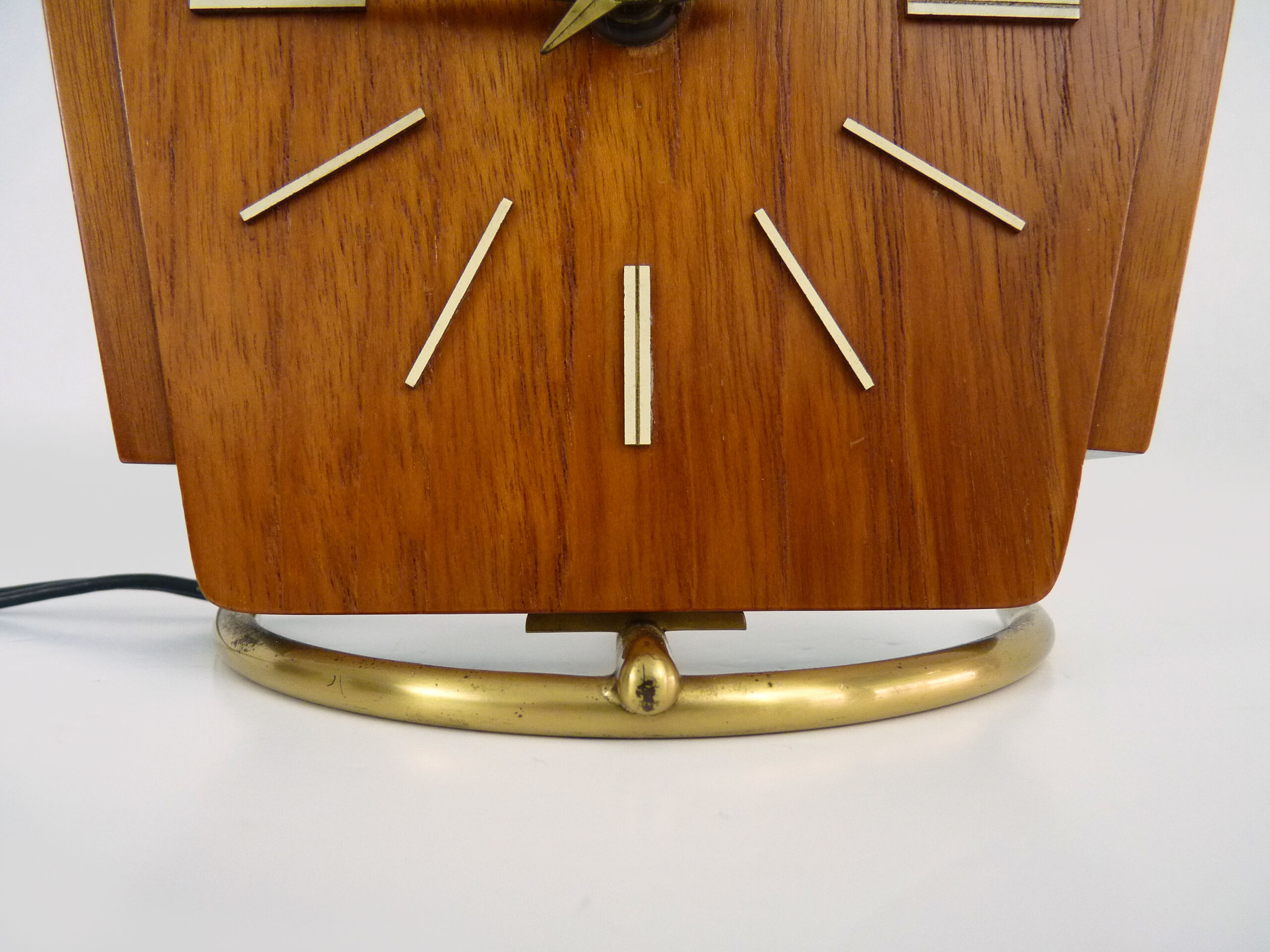 Table clock, art deco clock in Wuba Amsterdam in wood and brass. Year 50