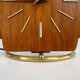 Table clock, art deco clock in Wuba Amsterdam in wood and brass. Year 50