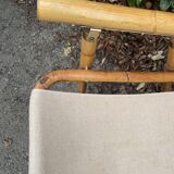 Rattan armchair and foldable canvas