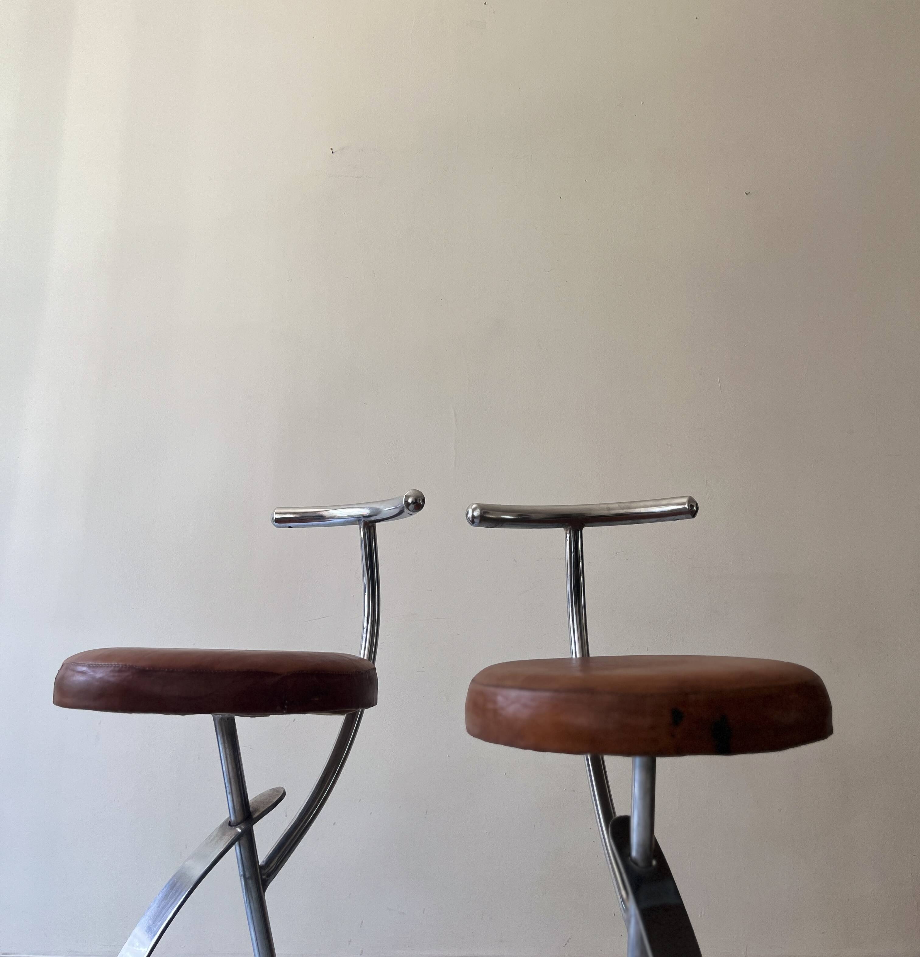 Bar stools in tubular chrome and tan leather, 1970s