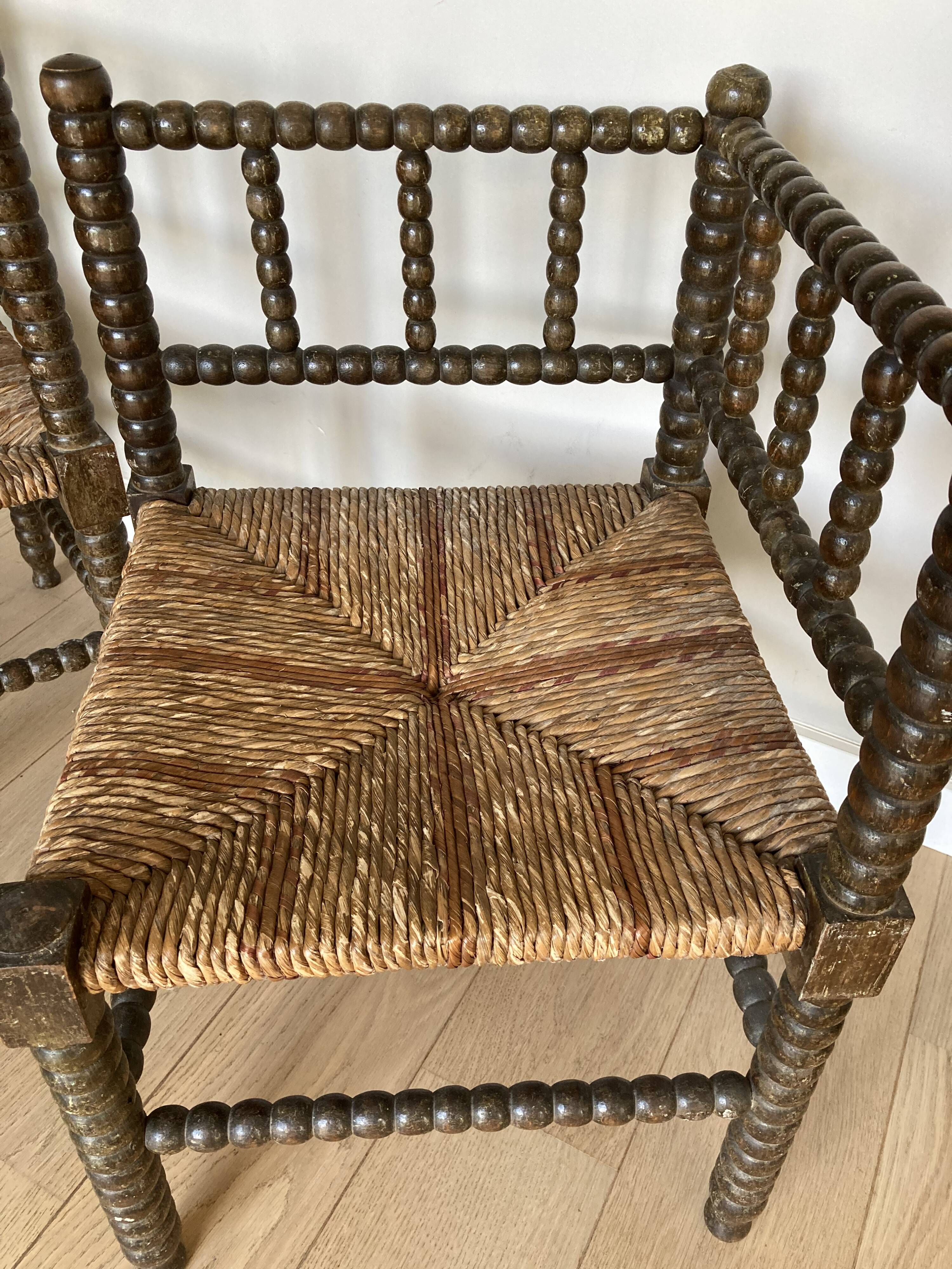 Turned wood corner armchairs