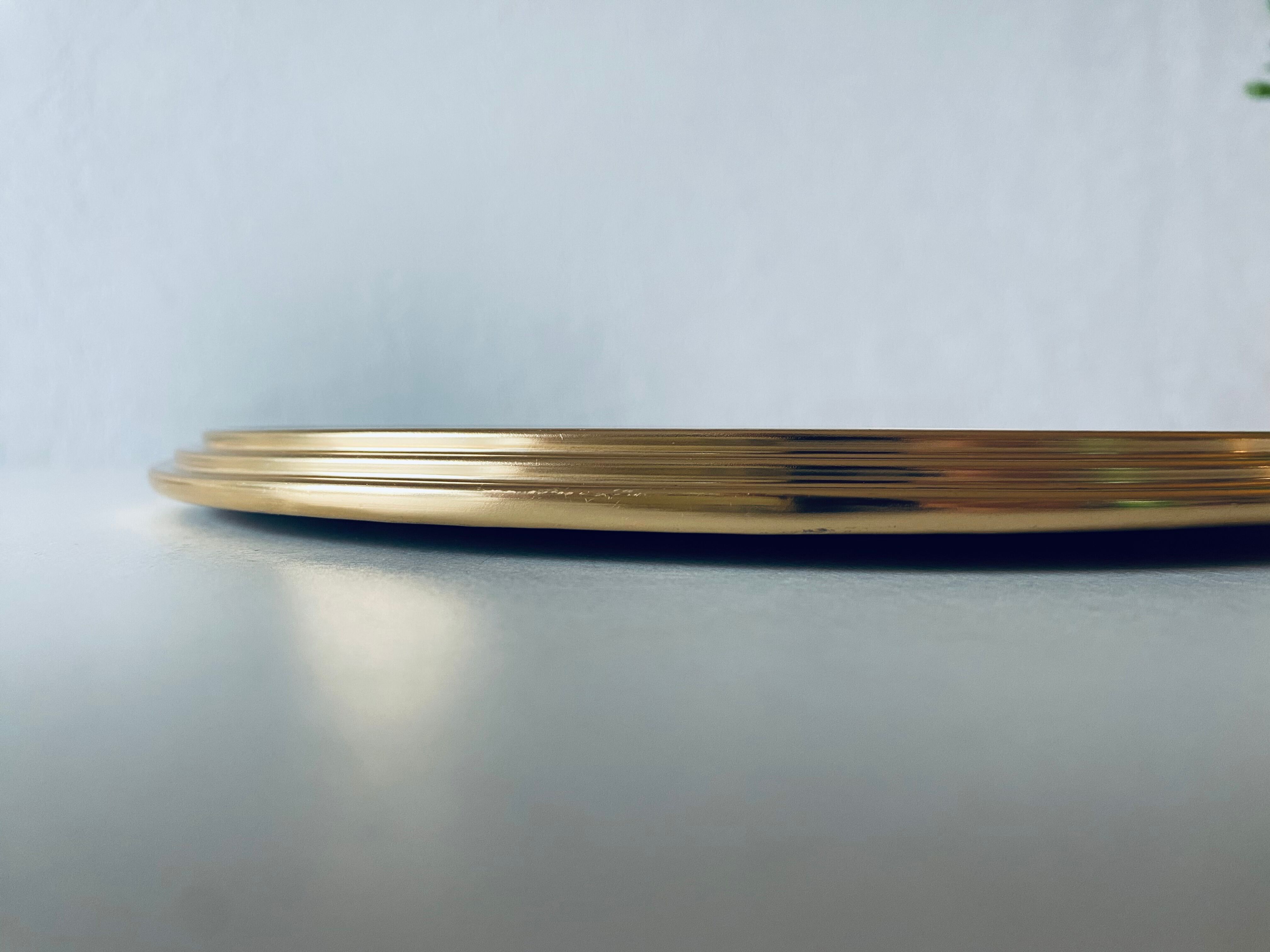 Vintage brass mirror