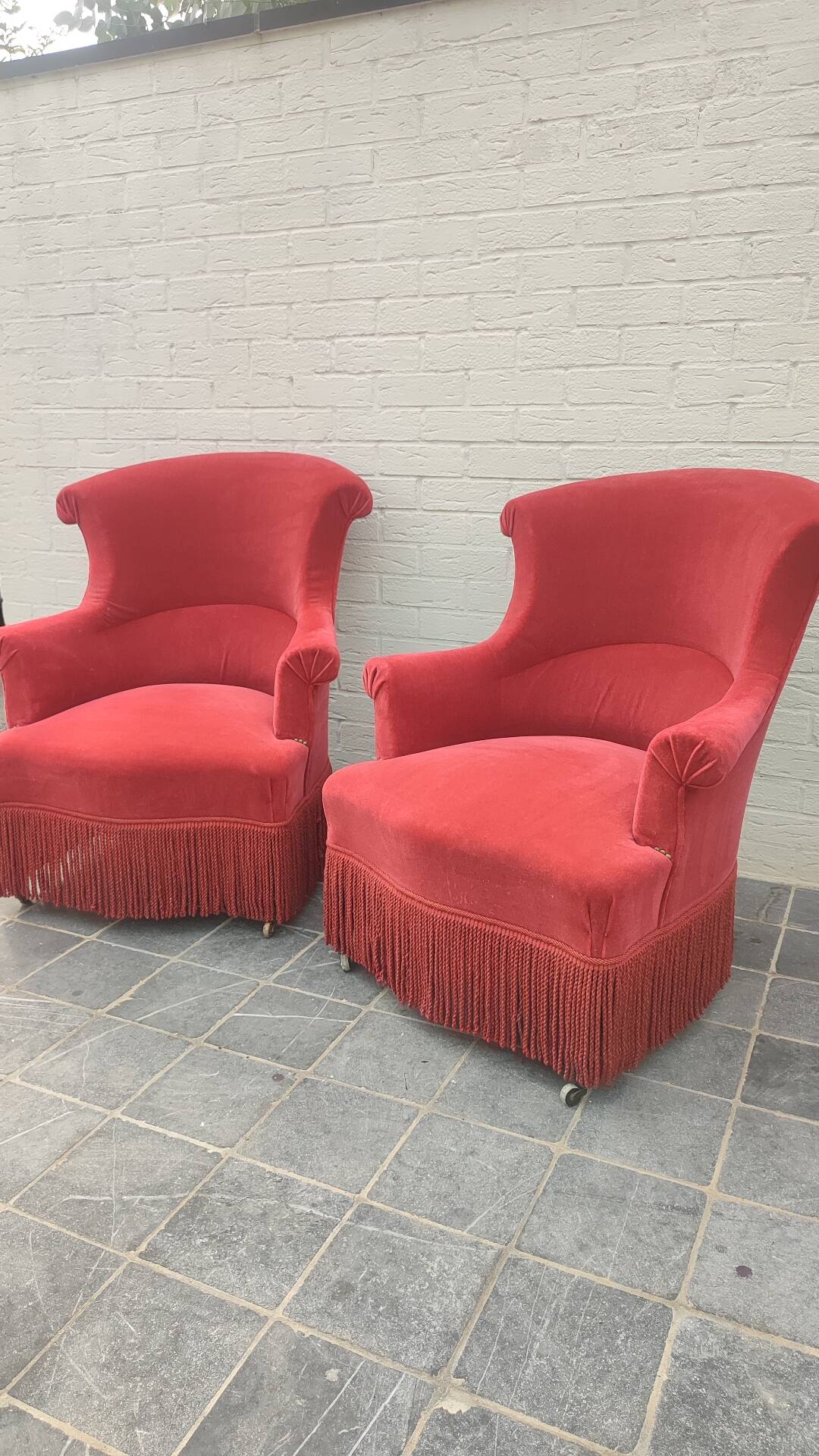 Pair of fringed crapaud armchairs