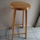 Top bar stool varnished wooden seat round