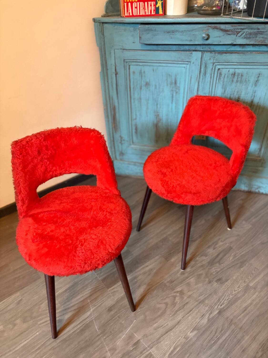 Pair of armchairs with splayed legs
