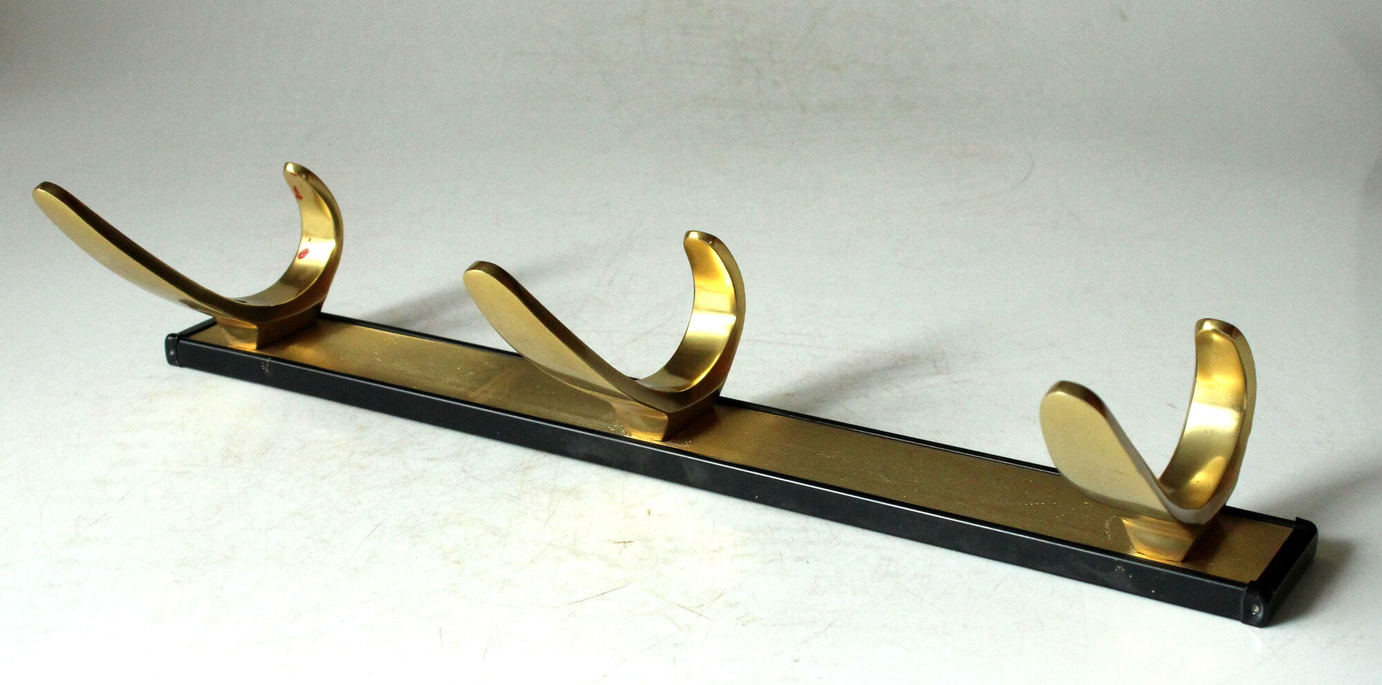 Rockabilly wall mounted metal  and brass coat rack with 3 hooks, vintage from the 1950s