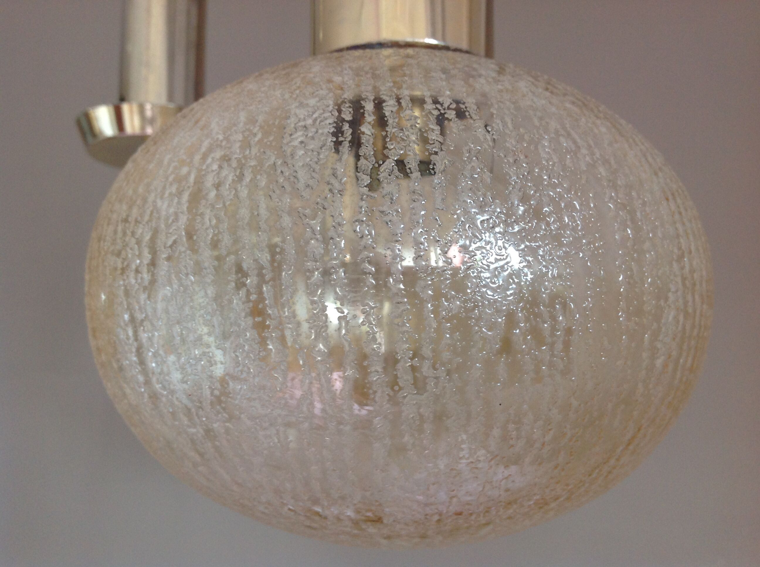 Three-globe brass chandelier in amber/vintage glass 60s-70s