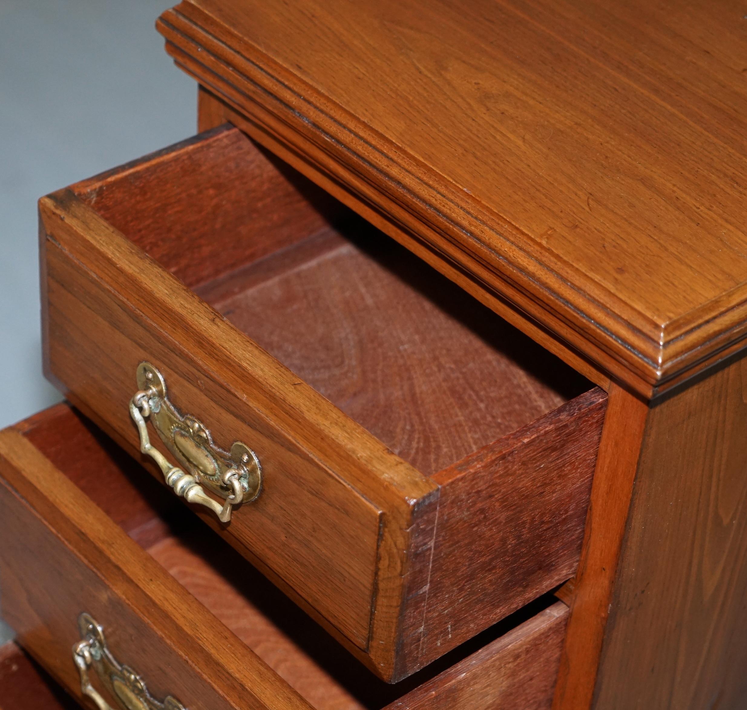 Pair of tall Victorian walnut chests of drawers