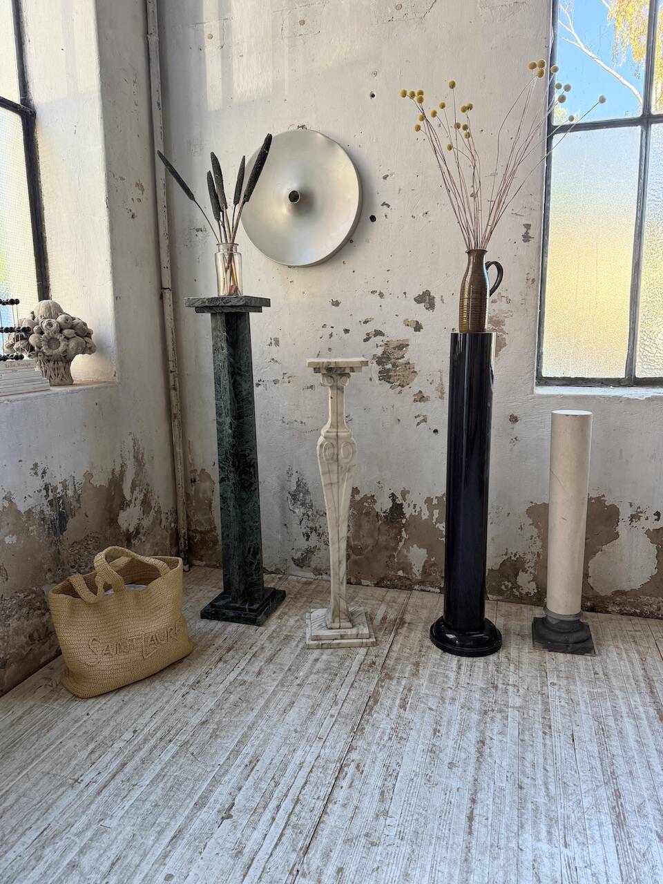 Set of 4 marble columns or pedestals.