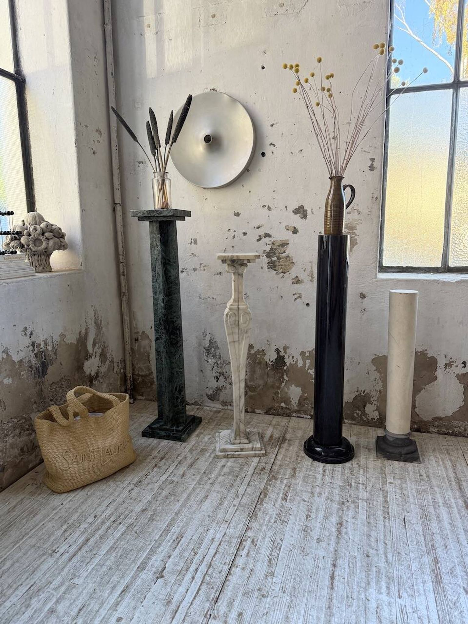 Set of 4 marble columns or pedestals.