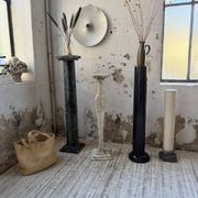 Set of 4 marble columns or pedestals.
