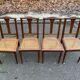 4 Art Deco solid oak cane chairs, circa 1950, with round legs