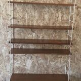 Vintage modular wall shelf with 4 supports and 5 levels.