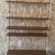 Vintage modular wall shelf with 4 supports and 5 levels.