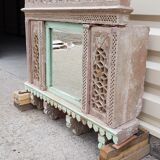 Fully hand-carved stone window with mirror