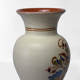 Vintage ceramic vase with bird decoration, signed.