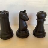 Trio of chess game candlesticks, rook, knight, pawn