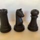 Trio of chess game candlesticks, rook, knight, pawn