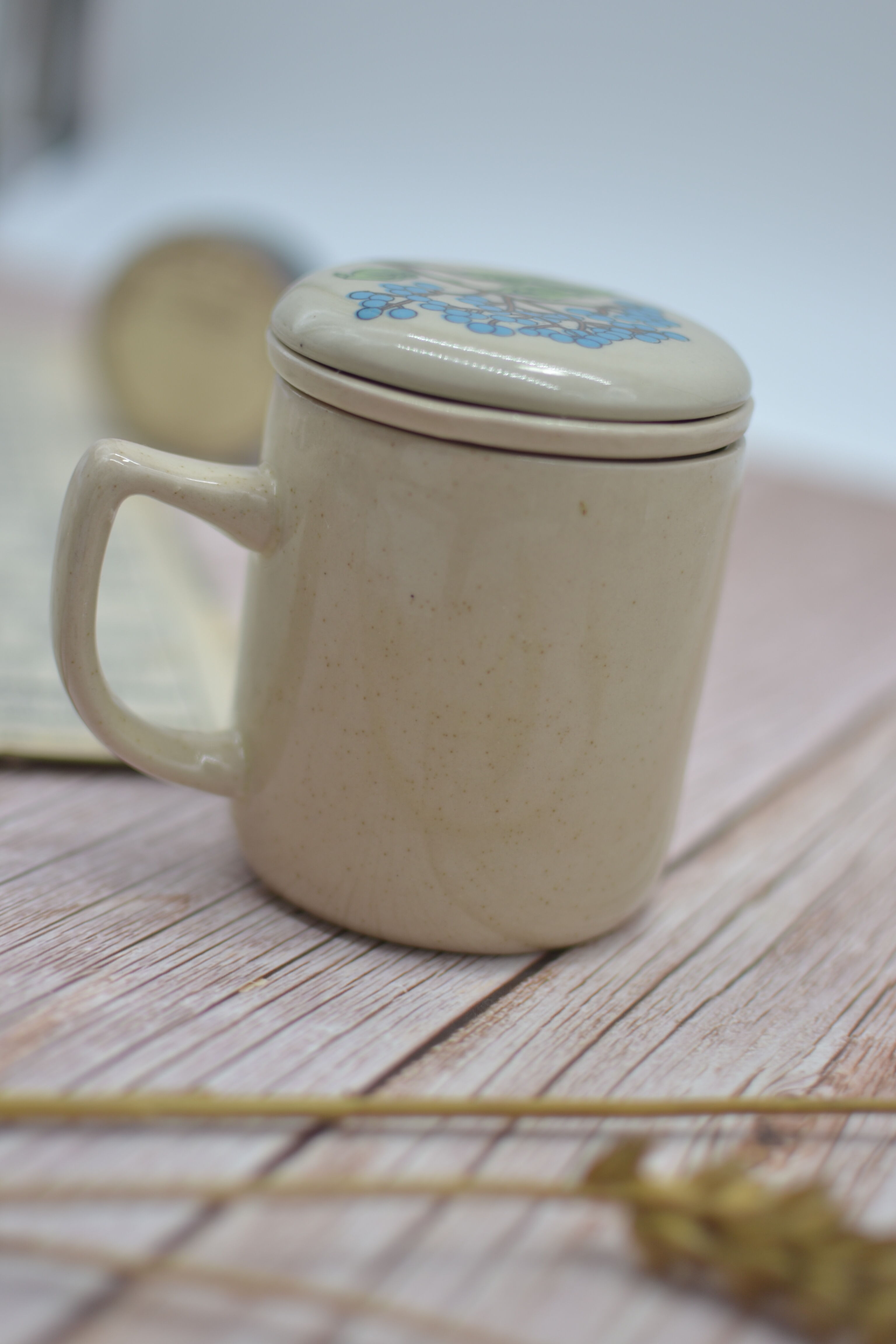 Vintage sandstone teapot with infuser