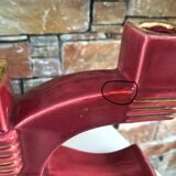 Former pair of burgundy ceramic candlesticks