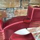 Former pair of burgundy ceramic candlesticks
